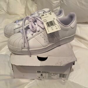 New in box Adidas Superstar J white tennis shoes, girls size 4
